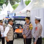 Kapolres Karawang Sambut Kunjungan Kerja Menko PMK Di Pos Terpadu Rest Area KM 57